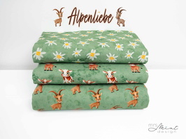 MrsMintDesign Alpenliebe Baumwolljersey Blueten Kuehe Steinboecke batik aquarell gruen 344603 351603 347603 q1 Typo