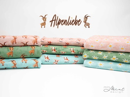 MrsMintDesign Alpenliebe Baumwolljersey Steinboecke Kuehe Blueten batik aquarell q2 Typo