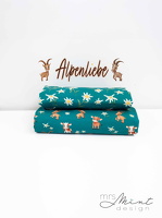 MrsMintDesign Alpenliebe Baumwolljersey Wiesenblumen Kuehe Steinboecke Ziege Floral petrol 345747 346747 h2 Typo