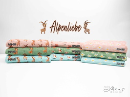 MrsMintDesign Alpenliebe Baumwolljersey Steinboecke Kuehe Blueten batik aquarell q1 Typo n